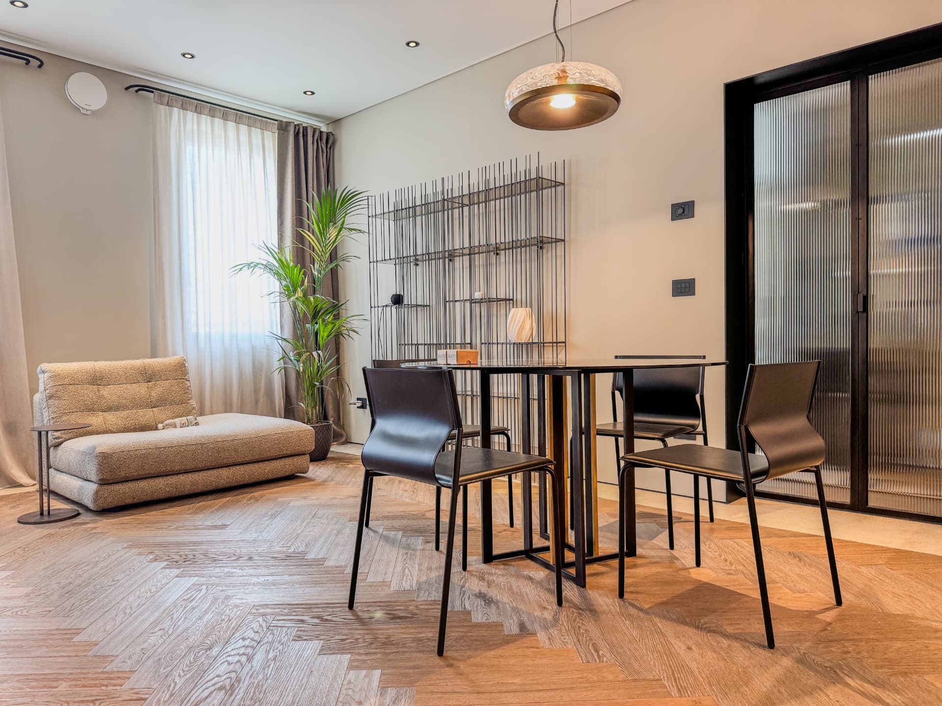 Living and dining interior at Borgo Fiume 18 in Treviso